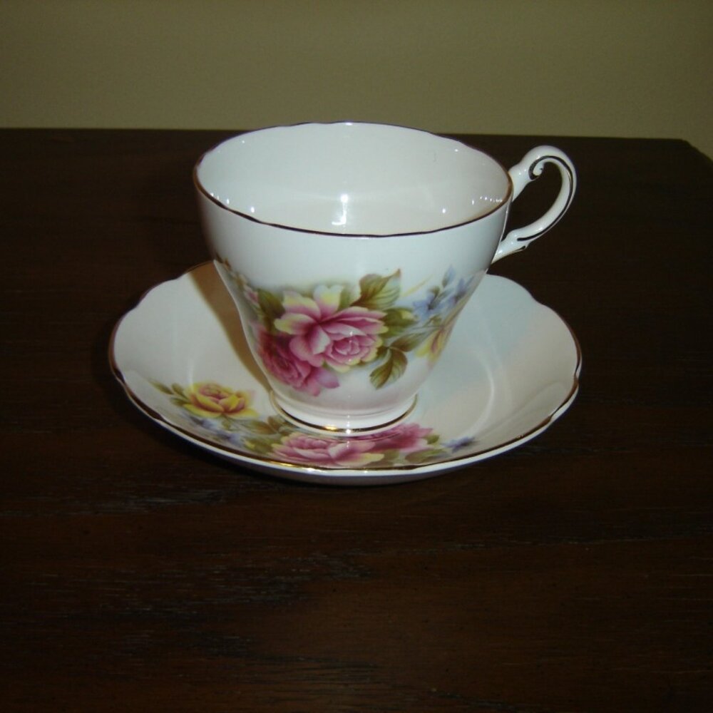 Regency pink yellow Rose cup and saucer VGU